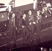 Fumble performing in "Elvis"